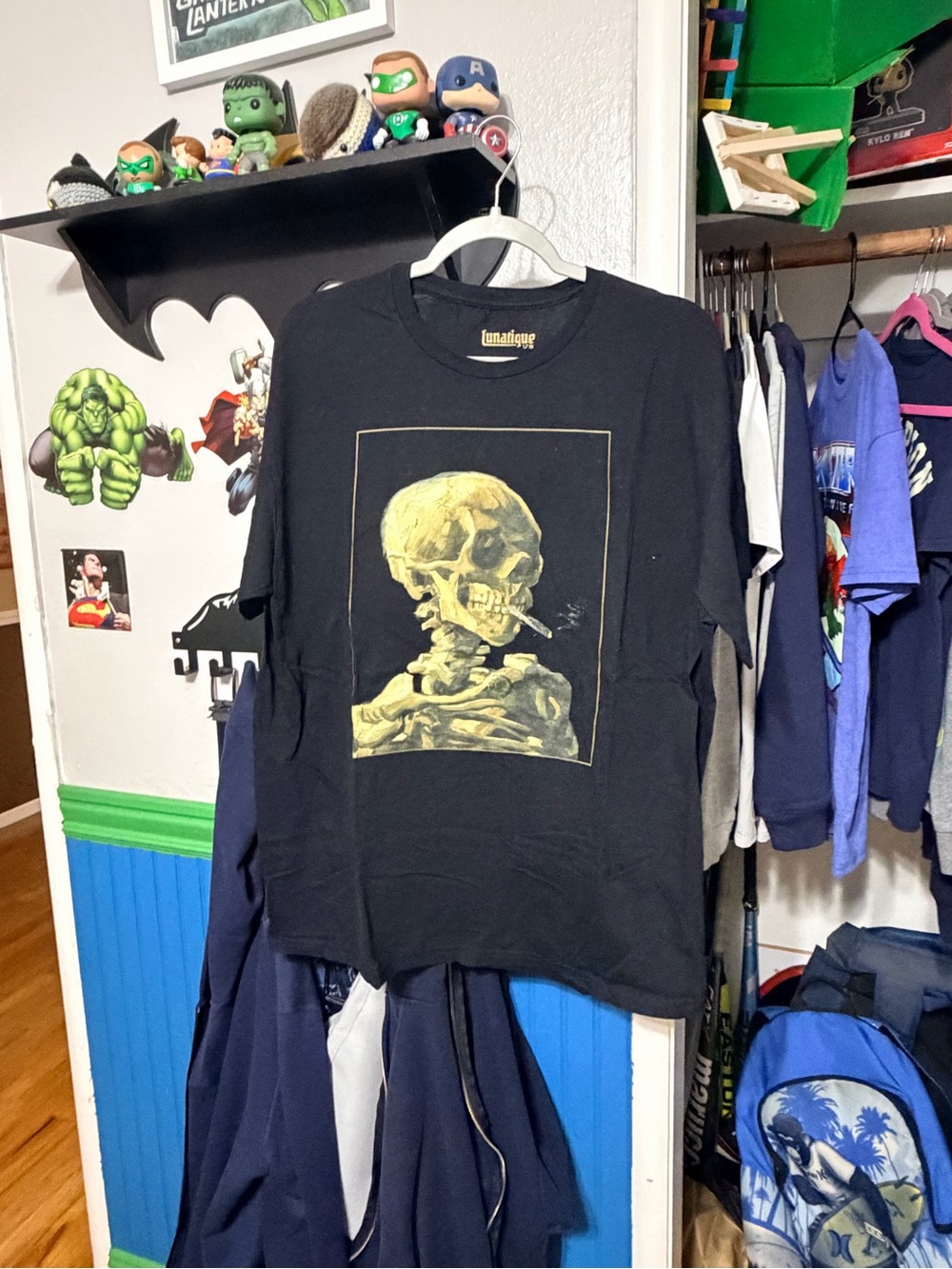 Black Short-Sleeve Graphic Tee with Yellow Skull Artwork
